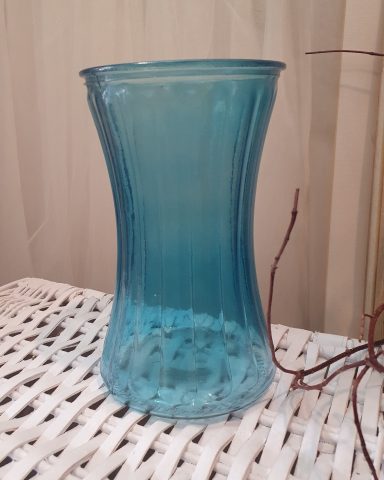 Turquoise glass vase with vertical ribbed design. Also available in red, pink, green and clear.